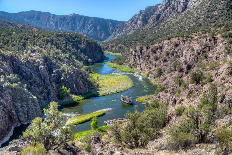 River flowing between cliffs at Gunnison Basin State Park