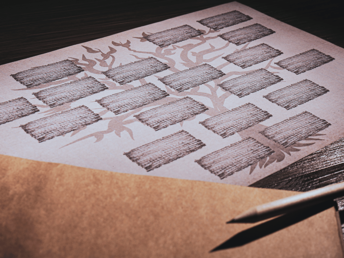 Image of large sheet of paper depicting sections to build a family tree. 
