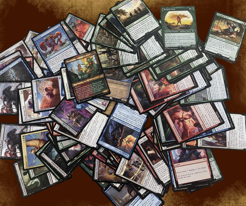 Image of a variety of game cards from Magic: The Gathering, spread across a table.