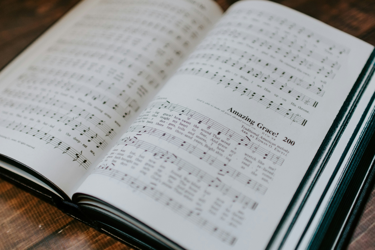 A music book open to Amazing Grace